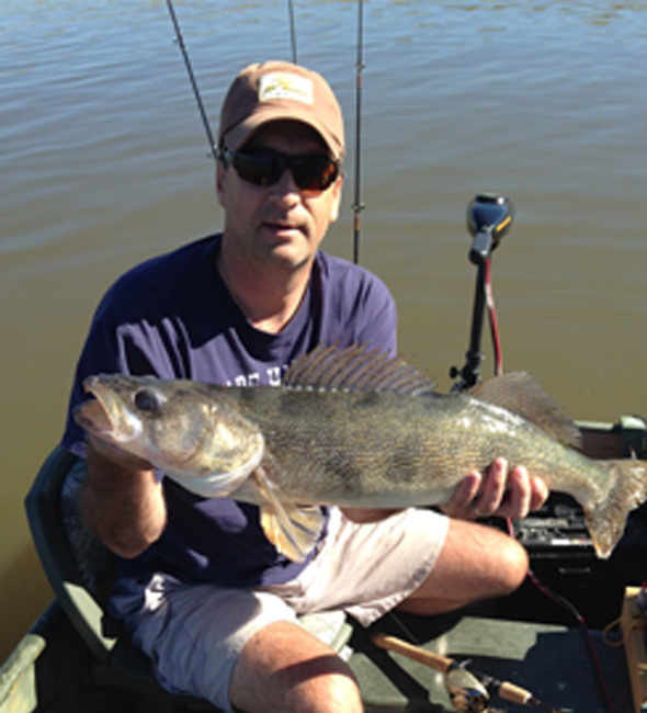 Jim holds the State of Colorado catch and release record for landing a 29-inch Saugeye!